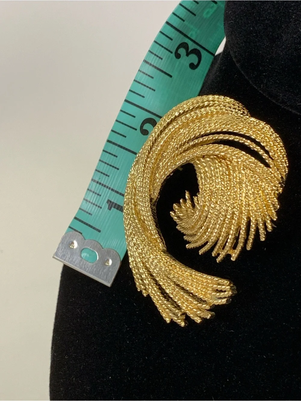 Vintage Monet Gold Tone Textured Swirl Brooch